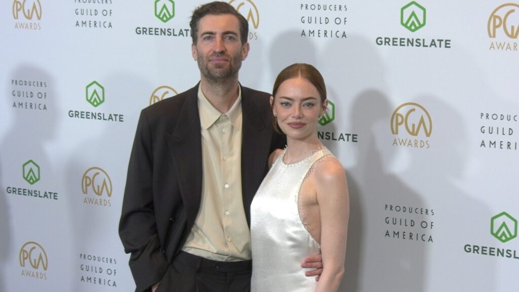 Dave McCary and Emma Stone on the black carpet at the 2026 PGA Awards