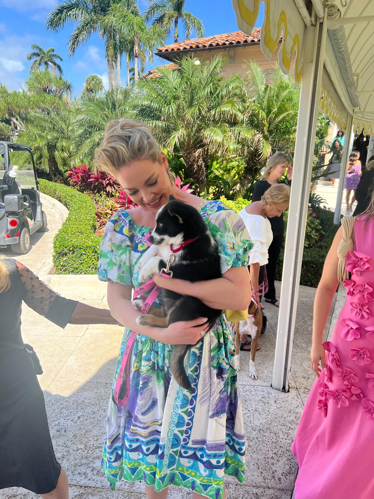 Actress Katherine Heigl holds a rescued dog at Big Dog Ranch Rescue's fundraiser at Mar-a-Lago in Palm Beach on Sunday, March 8, 2026.