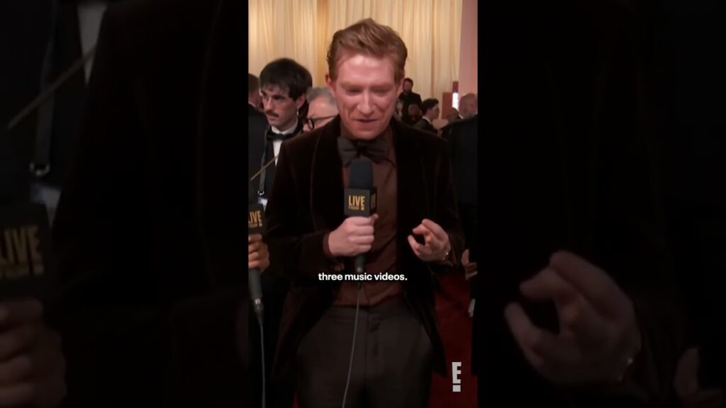 Domhnall Gleeson talks about being in Taylor Swift's "Opalite" music video at the #Oscars.