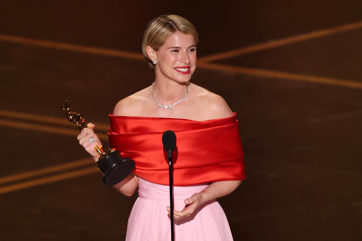 Jessie Buckley accepts the Oscar for actress in a leading role for "Hamnet."