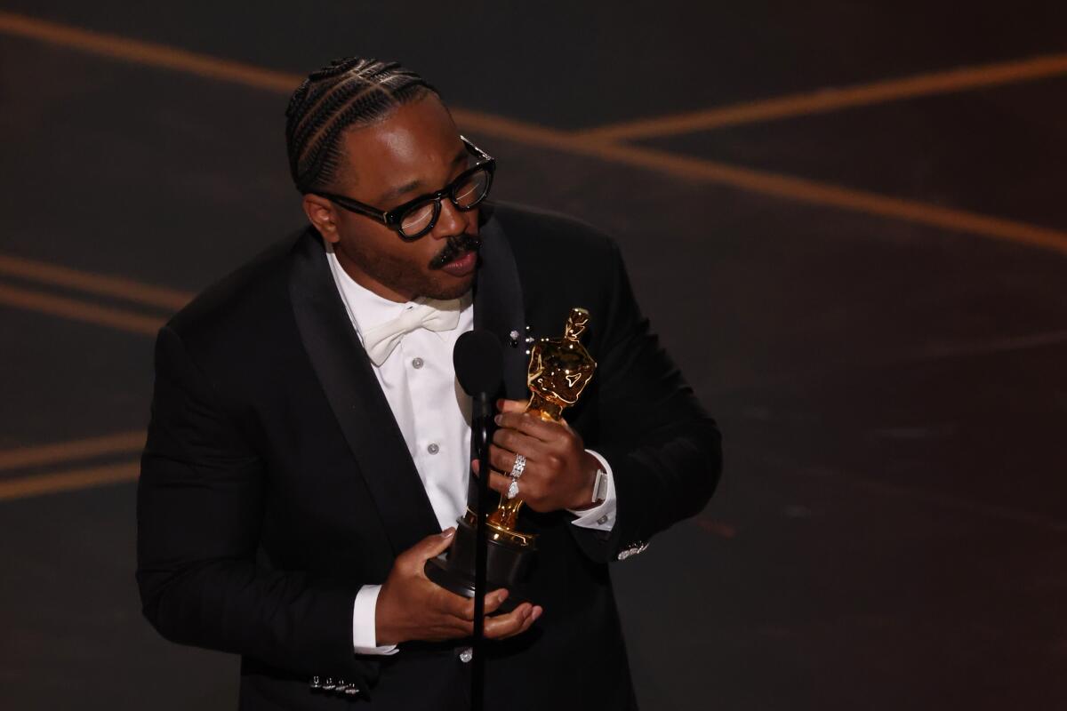 Ryan Coogler wins the Oscar for original screenplay for "Sinners" during the 98th Academy Awards.