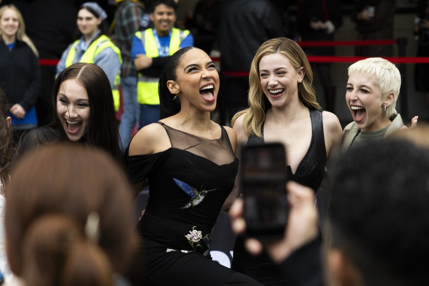 Lola Tung, Alexandra Shipp, Lili Reinhart and Emma Chamberlain take a photo together.