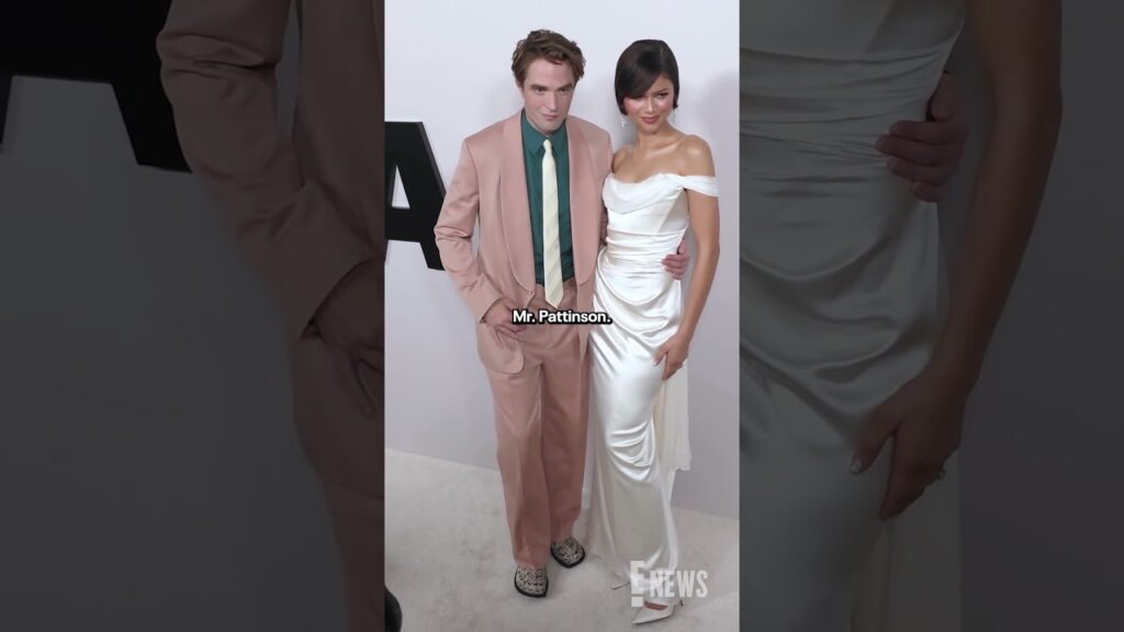 Robert Pattinson and Zendaya pose together at the Los Angeles Premiere of "The Drama." 😍💍