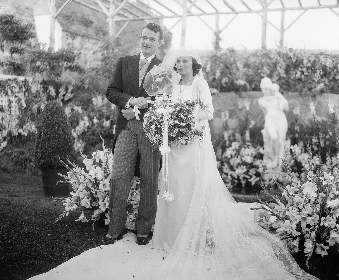 John Wayne and Josephine Saenz are photographed at their wedding in Los Angeles on June 24, 1933Credit: Bettmann Archive
