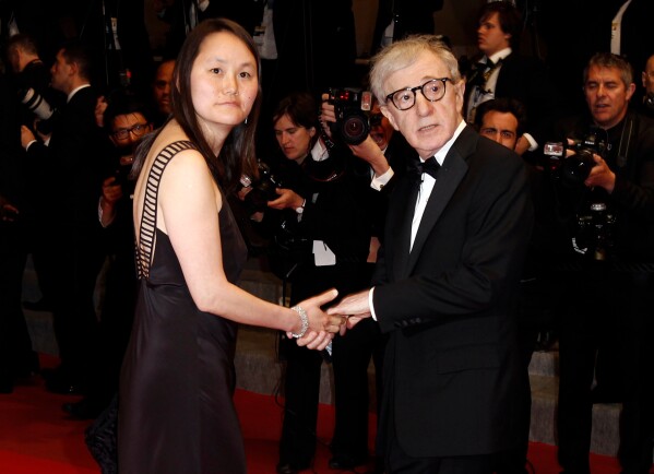 Filmmaker Woody Allen, right, and Soon-Yi Previn arrive for an event in Cannes, southern France, May 15, 2010. (AP Photo/Matt Sayles, File)