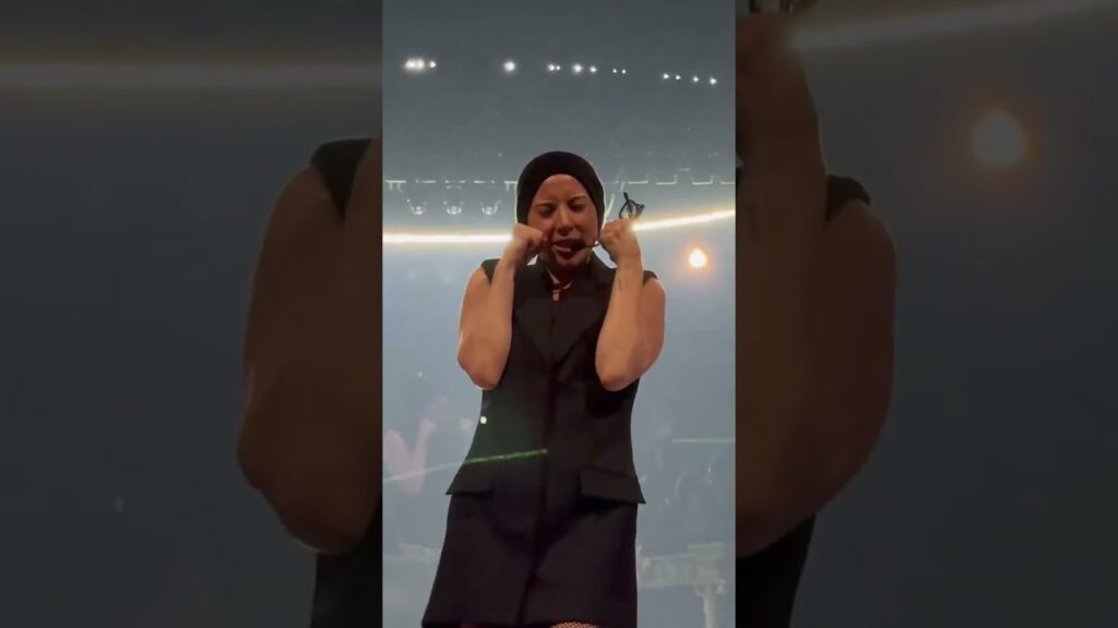 Lady Gaga sings along to “Plastic Doll” while taking her bow in Washington DC