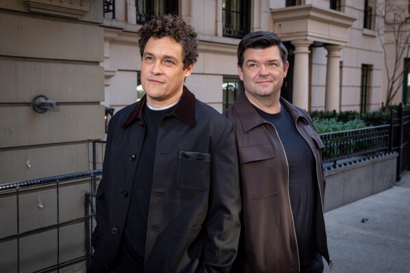 Phil Lord, left, and Chris Miller pose for a portrait to promote "Project Hail Mary" on Tuesday, March 17, 2026, in New York. (Photo by Andy Kropa/Invision/AP)