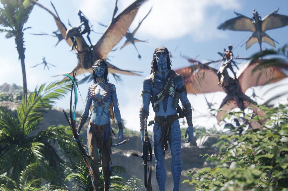 zoe saldana as neytiri, sam worthington as jake sully, avatar fire and ash