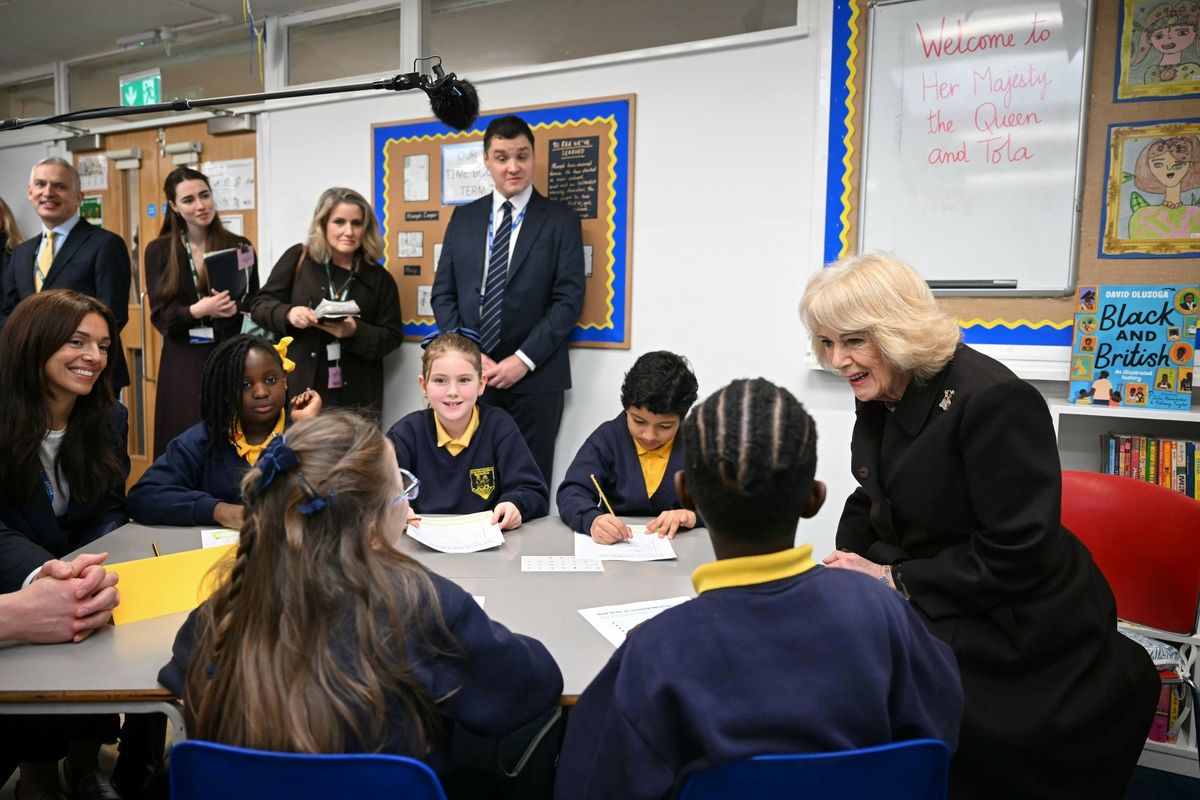 Queen Camilla reading to children
