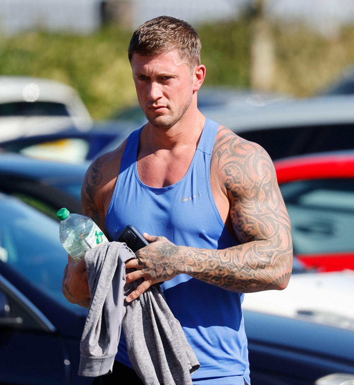 Dan was seen looking upset while heading in to the gym