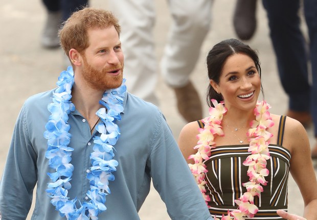 SYDNEY, AUSTRALIA - OCTOBER 19: Prince Harry, Duke of Sussex and Meghan, Duchess of Sussex arrive to talk to OneWave members, a local surfing community group raising awareness for mental health and wellbeing on Bondi Beach on October 19, 2018 in Sydney, Australia. The Duke and Duchess of Sussex are on their official 16-day Autumn tour visiting cities in Australia, Fiji, Tonga and New Zealand. (Photo by Ryan Pierse/Getty Images)