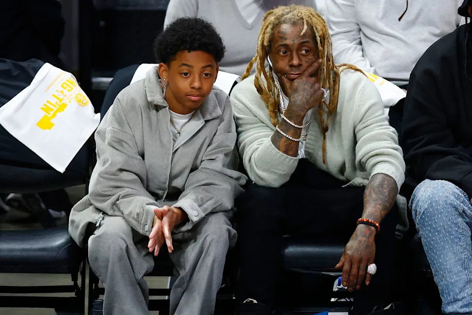 Lil Wayne and son KameronCredit: Justin Edmonds/Getty