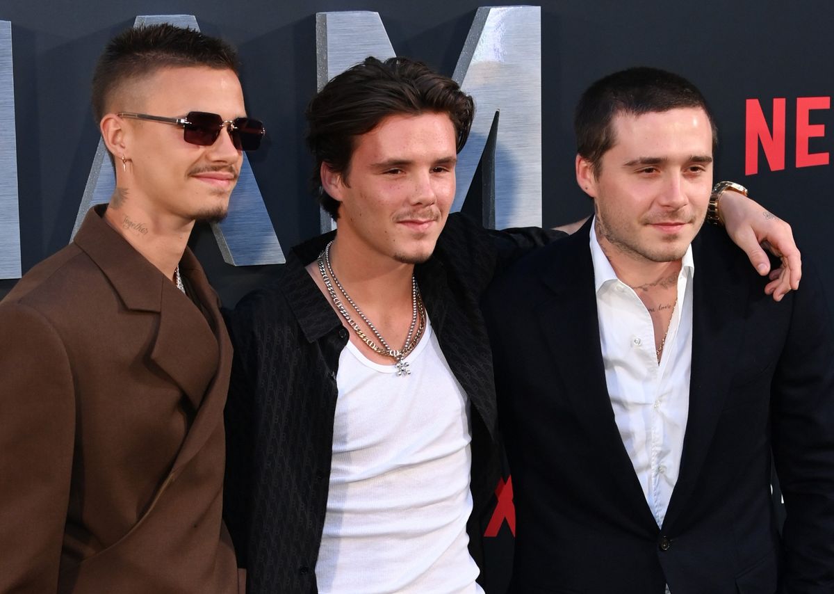 Cruz Beckham with his brothers Romeo and Brooklyn