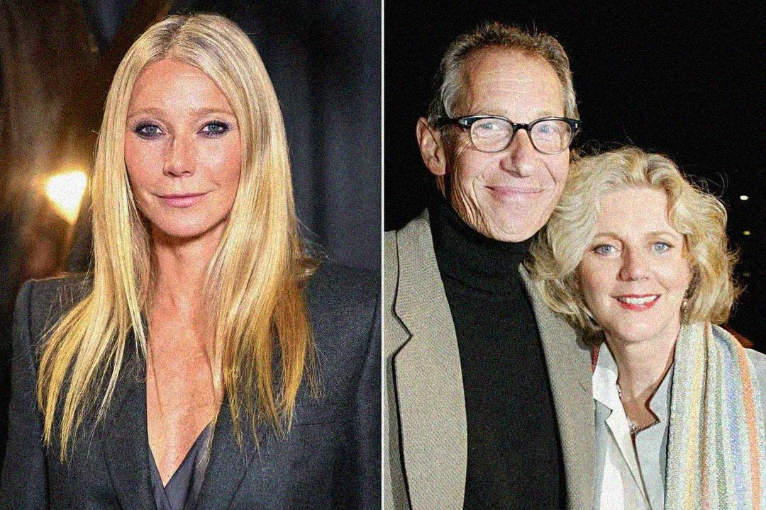 A woman with long blonde hair in a dark blazer on the left; on the right, an older man in glasses and a turtleneck stands next to a smiling woman with short blonde hair, both dressed in light-colored clothes.