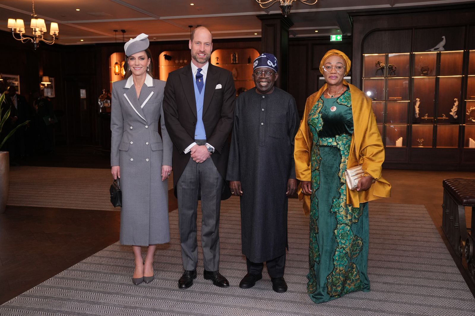 Image may contain Oluremi Tinubu Prince William Duke of Cambridge Bola Ahmed Tinubu Person Adult People and Clothing