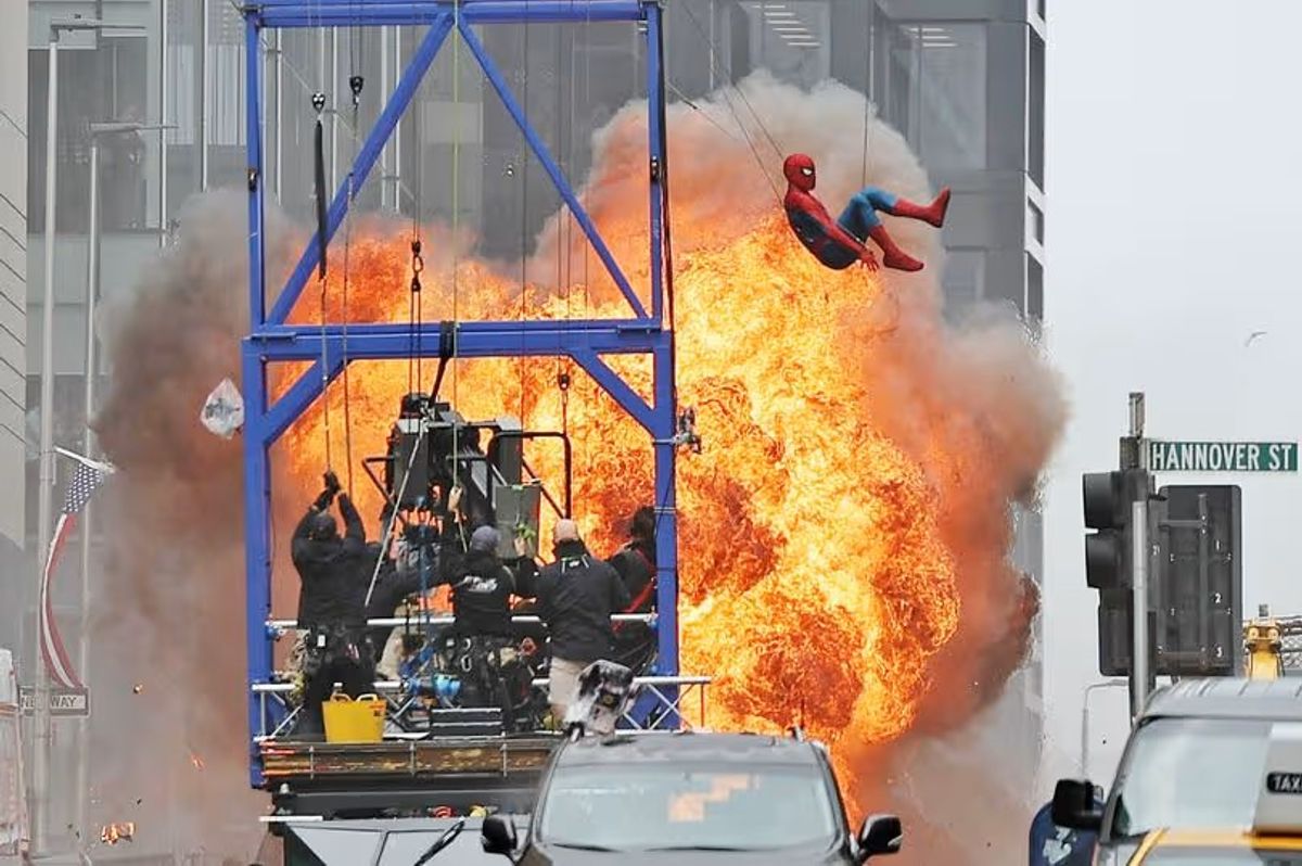 Spiderman stunt double with swinging from crane.
