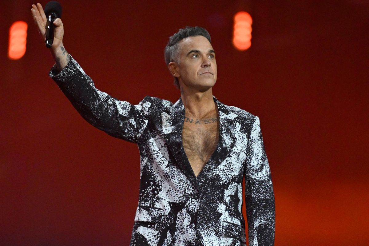 Robbie Williams on stage at the Brits