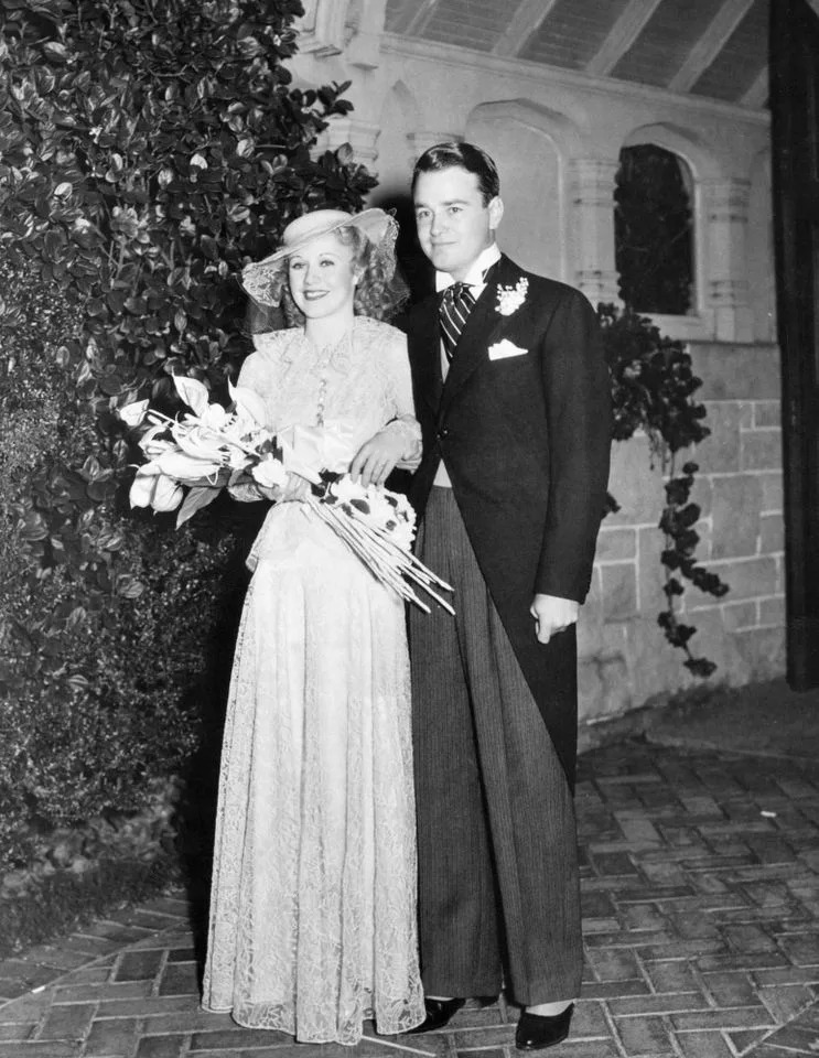 Ginger Rogers and Lew Ayres pose for a photo on their wedding day on Nov. 14, 1934Credit: George Rinhart/Corbis via Getty
