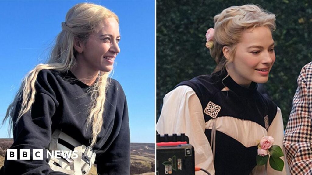 Wuthering Heights: The body doubles behind Emerald Fennel’s hit Jacob Elordi in a black suit as Heathcliff and Margot Robbie as Cathy in a white and red PVC dress