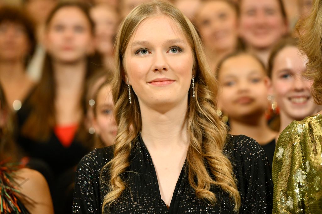 Princess Eleonore of Belgium in a black sparkly dress at a Christmas concert.