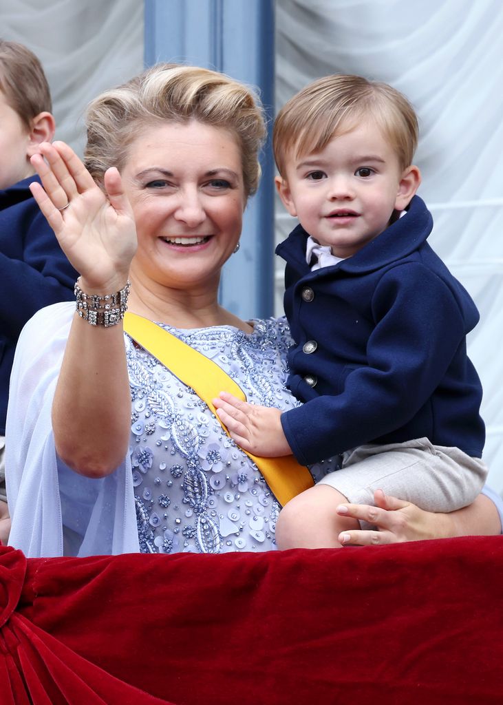 Prince François of Luxembourg held by the Grand Duchess.