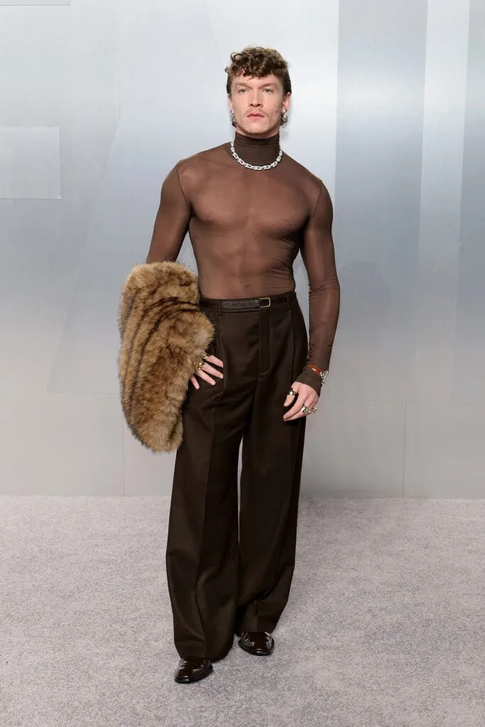 Hudson Williams Vanity Fair Oscar Party 2026, Hudson Williams sheer top Saint Laurent, Vanity Fair Oscar Party 2026 red carpet Hudson Williams, Saint Laurent Vanity Fair Oscar Party Hudson Williams, Hudson Williams Oscars after party look, Connor Storrie Vanity Fair Oscar Party 2026, Connor Storrie sheer brown top Saint Laurent, Vanity Fair Oscar Party 2026 red carpet Connor Storrie, Saint Laurent Vanity Fair Oscar Party Connor Storrie, Connor Storrie Tiffany & Co jewellery Oscars party, Connor Storrie brown sheer look Oscars after party