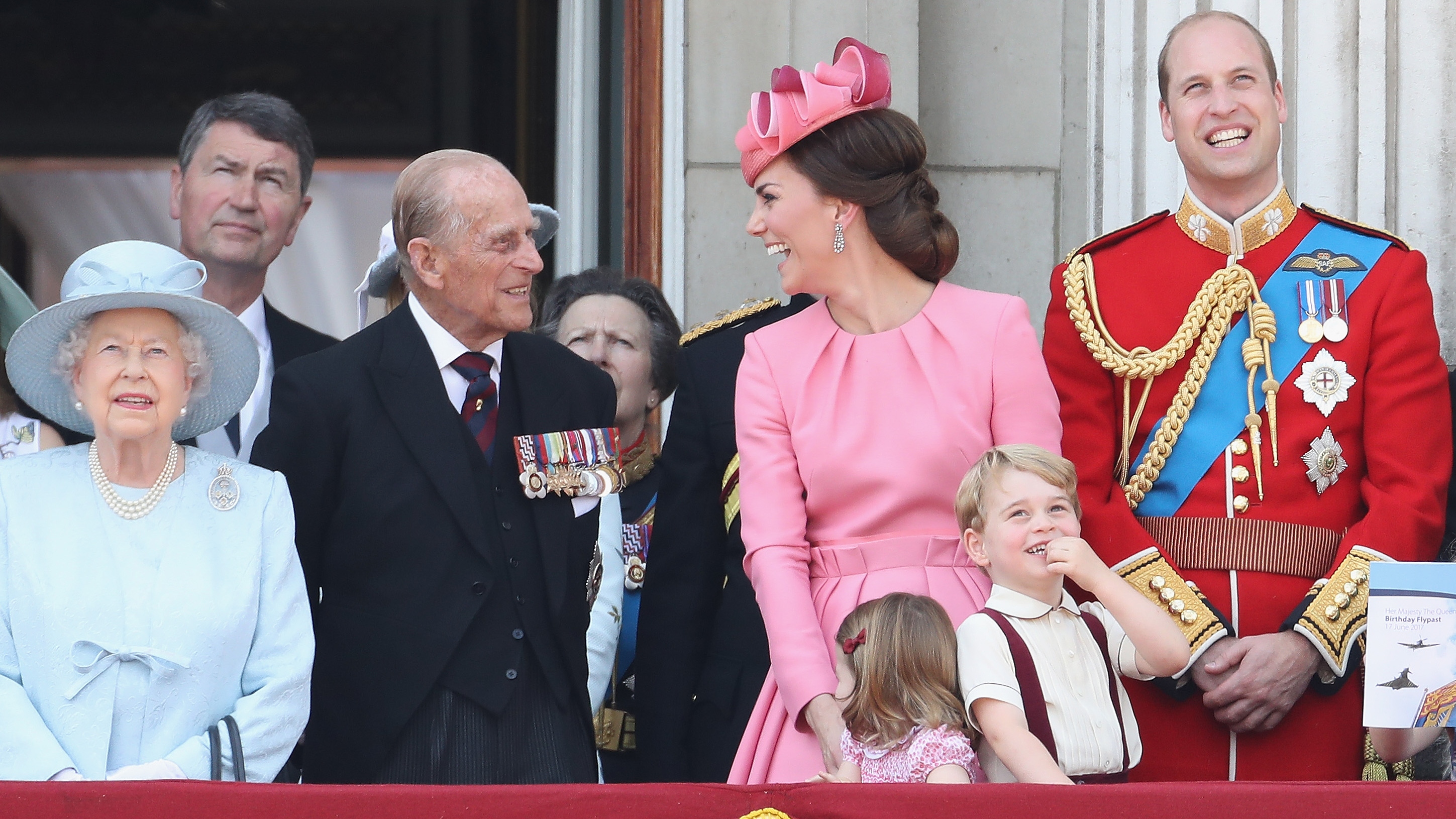 Queen Elizabeth II, Prince Philip, Catherine, Princess of Wales, Princess Charlotte, Prince George and Prince William look out from the balcony of Buckingham Palace during the Trooping the Colour parade on June 17, 2017
