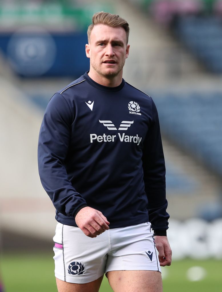 A photo of a rugby player walking