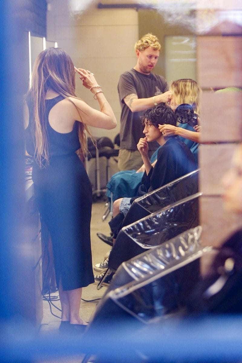 
Lopez looked effortlessly chic in a black dress paired with flats and a stylish mini bag, while Emme kept it casual in a gray tee, denim shorts, and a cap. 