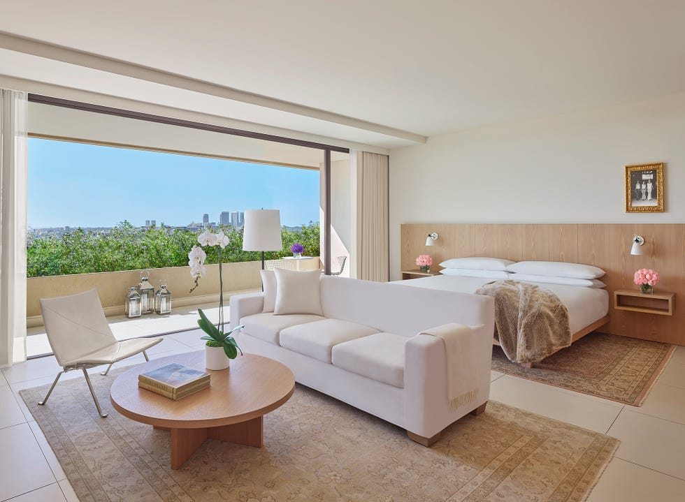 modern hotel room with a city view