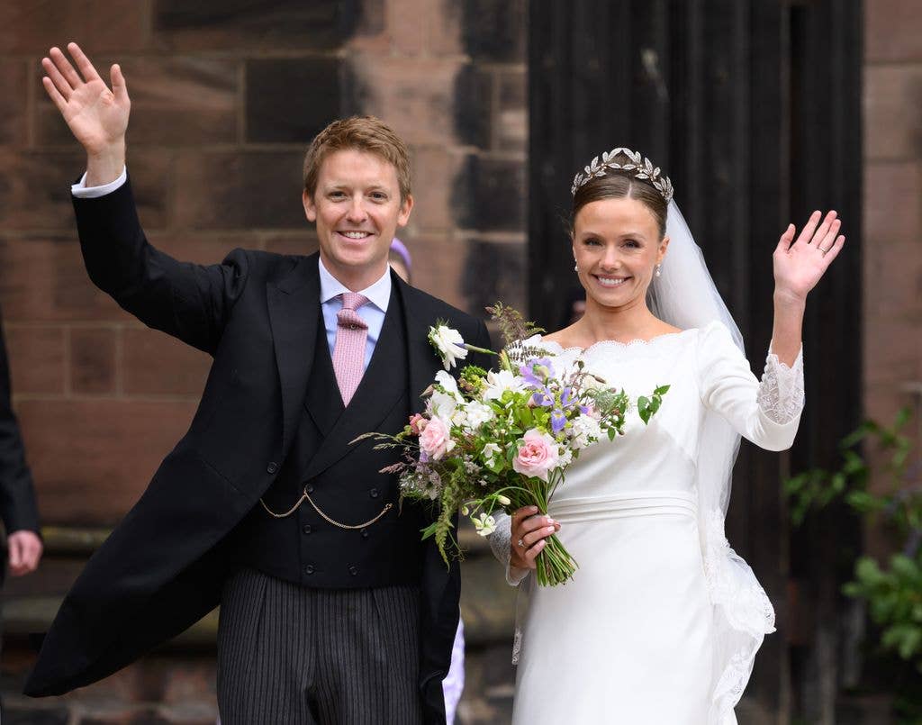 Hugh Grosvenor, Duke of Westminster and Olivia Grosvenor, Duchess of Westminster wave and smile to well-wishers after their wedding ceremony