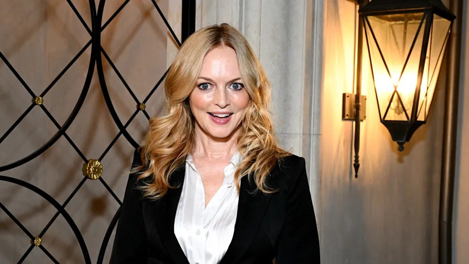 Heather Graham wears a suit
