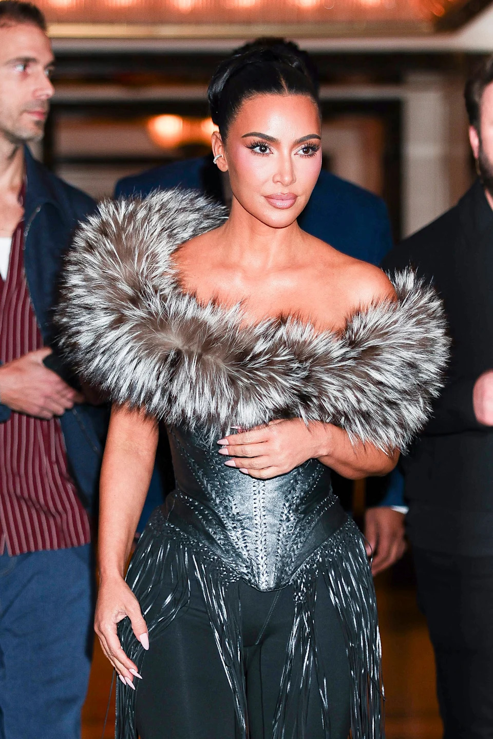 Kim walking outdoors