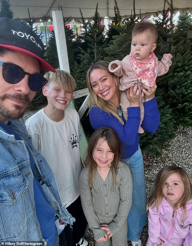 Missing from Duff and the 38-year-old music producer's side in New York were their blended brood of four children (pictured 2024)