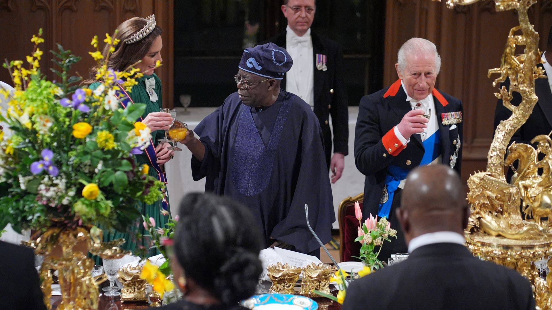 Kate Middleton clinking glasses with Bola Ahmed Tinubu