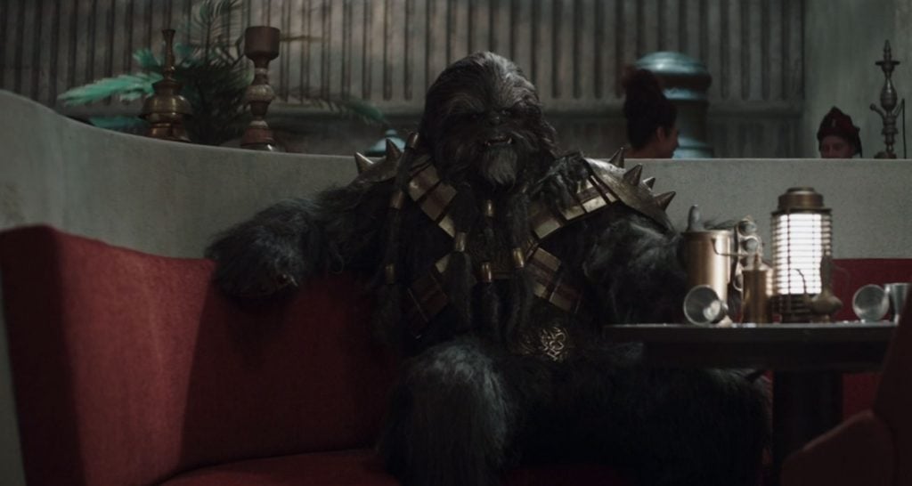 Black Krrsantan sitting in Sanctuary