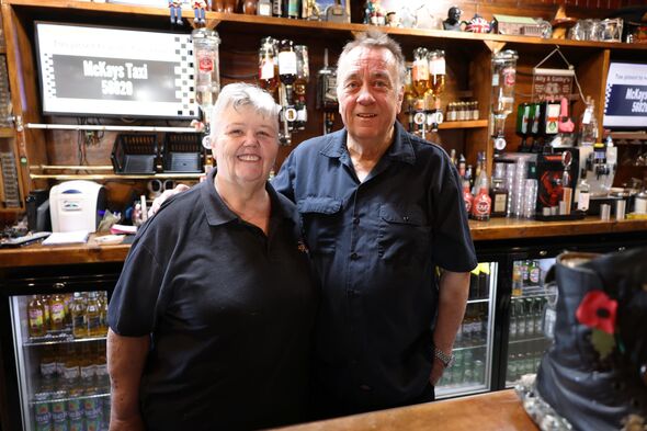 Cathy and Alistair behind the bar at The Victory