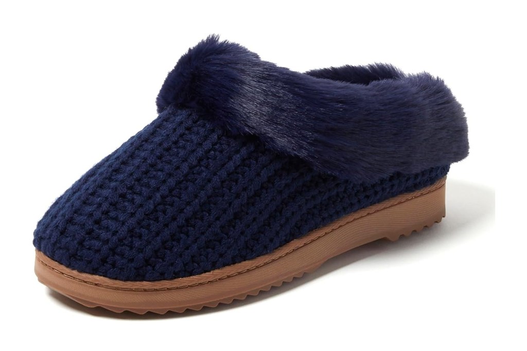 Navy blue knitted Dearfoams  slipper with a faux fur cuff and a brown sole.