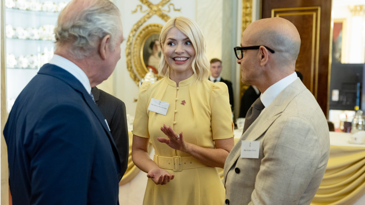 Holly Willoughby, King Charles and Stanley Tucci at Buckingham Palace in 2023