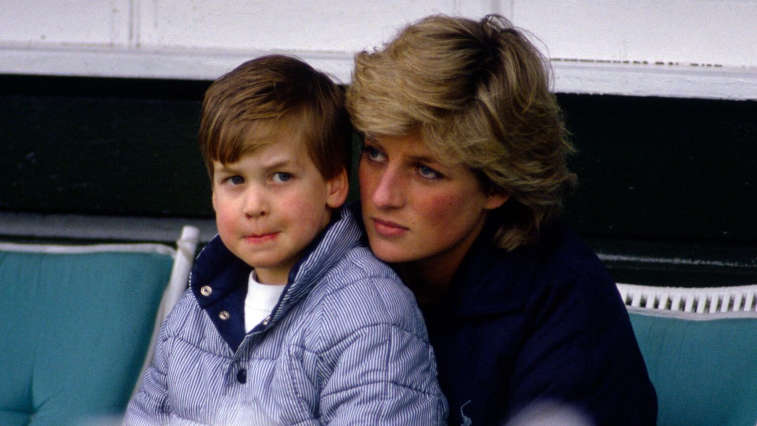 Prince William sits on mom Princess Diana's lap at Guards Polo Club in May 1987