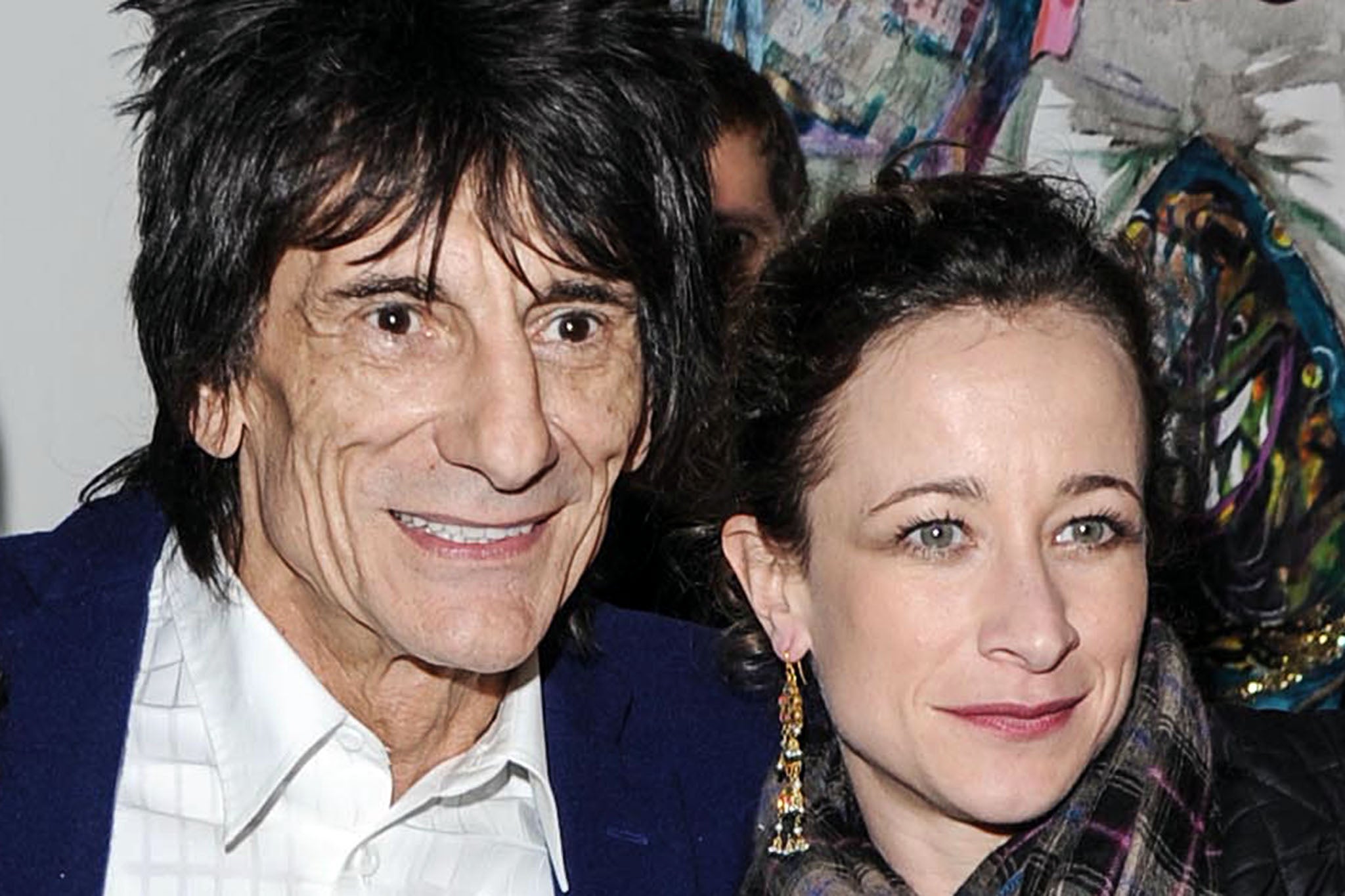 Ronnnie Wood with his daughter Leah, who claims it’s a good thing her dad hasn’t given her millions of pounds