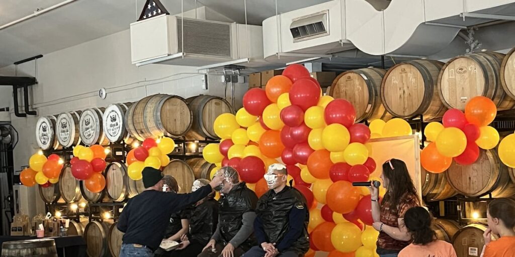 Celebrity Pie Smashing held at Barrel and Beam for Spread Goodness Day