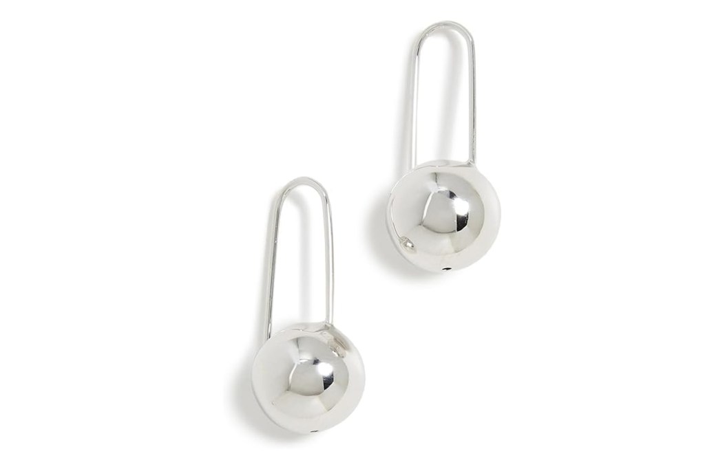 A pair of silver ball drop earrings.
