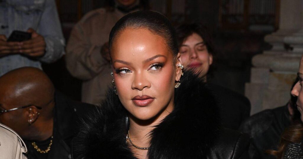 A woman in her 30s was arrested after allegedly firing approximately nine shots from an AR-style rifle toward Rihanna's Beverly Hills mansion on Sunday