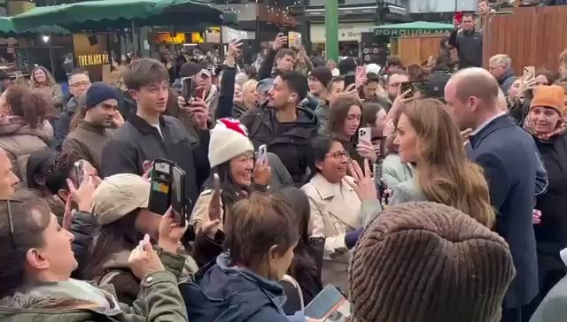 Will and Kate greeting the crowd at London's Borough Market today