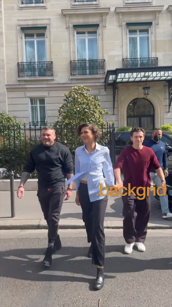 Zendaya and Tom Holland greets fans outside their hotel in Paris, fans tell Tom he looks amazing and he responds with, "*She* looks amazing."