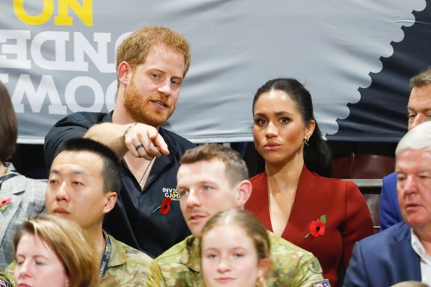Prince Harry, Duke of Sussex√äand√äMeghan, Duchess of Sussex watching Netherlands and United States of America competes in the Wheelchair Basketball Gold metal macth during day eight of the Invictus Games Sydney 2018 at on October 27, 2018 in Sydney, Australia. (Photo by Chris Jackson/Getty Images)