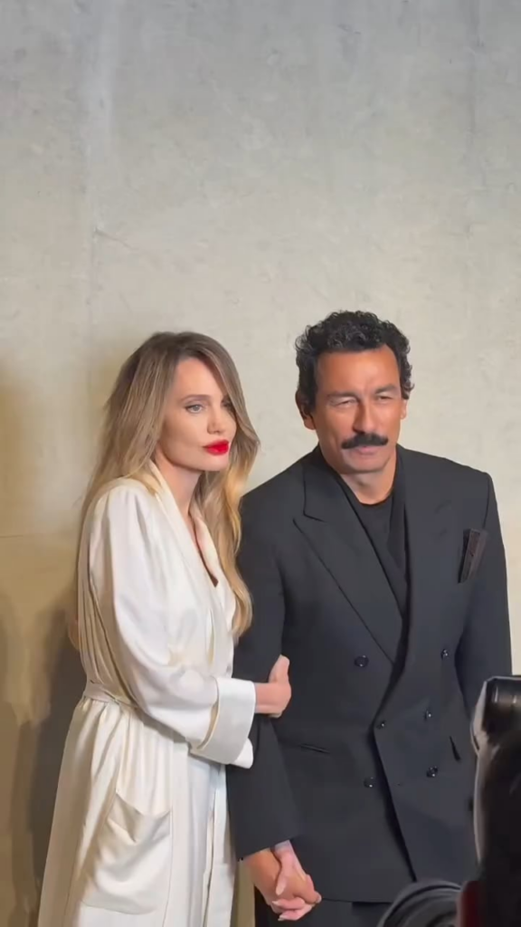 Angelina Jolie with Haider Ackermann, Creative Director of Tom Ford, at an event in Shanghai, China