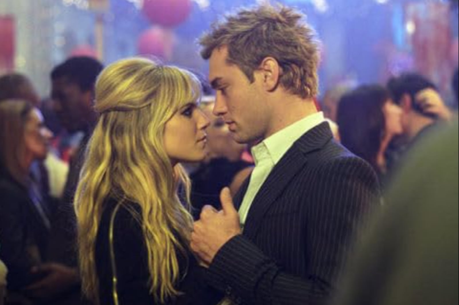 Sienna Miller and Jude Law in "Alfie" in 2004.