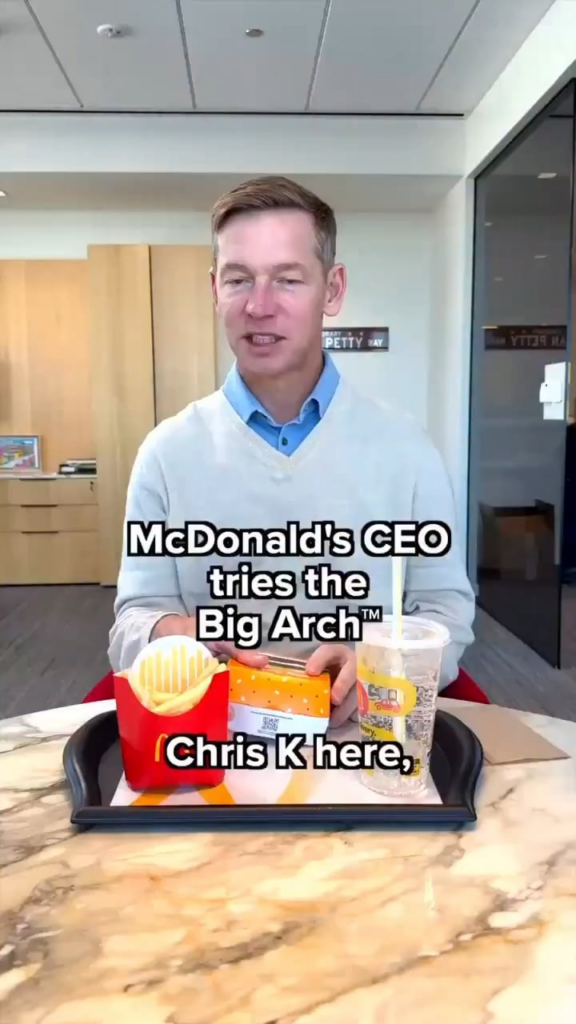 McDonald’s CEO Chris Kempczinski goes viral after seeming reluctant to eat his own burgers—he takes a tiny bite, looks uncomfortable, and calls the food ‘product.’